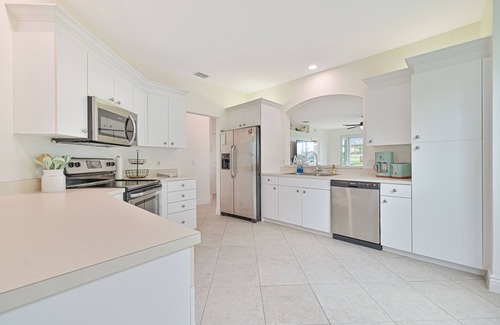 Naples Condo | First Floor Naples coach home with Golf Course View & Resort Style Amenities!