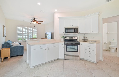 Naples Condo | First Floor Naples coach home with Golf Course View & Resort Style Amenities!