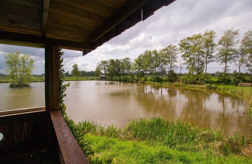 Detern Apartment | Fischerhütte - Ferienhof Am Birkensee, 55125