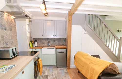 Rhydwyn Cottage | FISHERMAN'S COTTAGE, pet friendly, with open fire in Church Bay