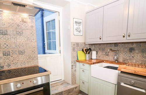 Rhydwyn Cottage | FISHERMAN'S COTTAGE, pet friendly, with open fire in Church Bay
