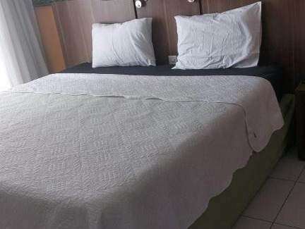 Centro Hotel | Flat com varanda, quarto de Morador Hotel 1112
