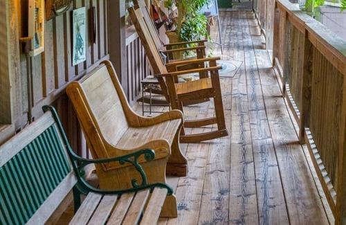 Mount Ida Condo | Forest view, log-sided two bedroom, two bath condo on Lake Ouachita. by RedAwning