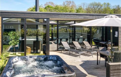 Pøt Strandby House | Four-Bedroom Holiday Home With A Fireplace In Juelsminde