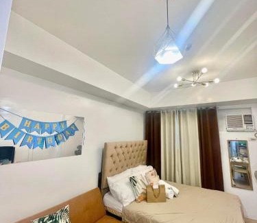 South Triangle Apartment | Frabeca Staycation at Mplace Condo QC