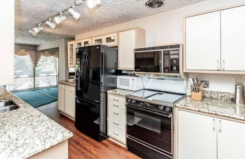 North Central Omaha House | Frank Lloyd WrightishMid Century Mod Time Capsule