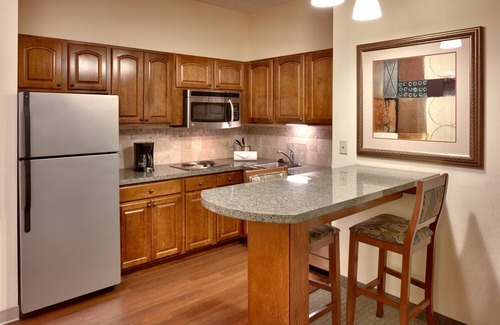 Omaha Condo | Free Breakfast. Pool. Gym. Close to the Children’s Hospital!