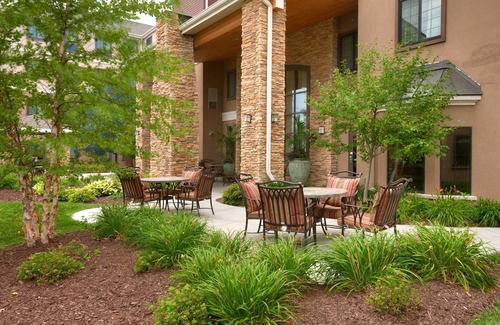 Omaha Condo | Free Breakfast. Pool. Gym. Close to the Children’s Hospital!