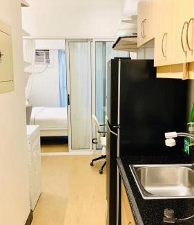 Kapitolyo Apartment | Free Car Parking - Sheridan North 1BR Apt near BGC