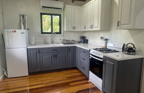 Spanish Lookout House | Full Belizean Cabinnn