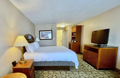 Chinatown Hotel | Fun and Relaxation Await in Chic Houston Room with Pool Near Memorial City Mall