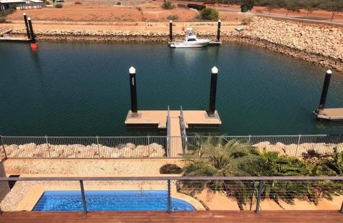 Exmouth House | Gecko - On the Marina with Pool & Private Jetty