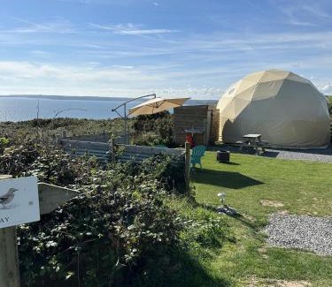 Llanybri House | Geodome Glamping with sea views near Pendine