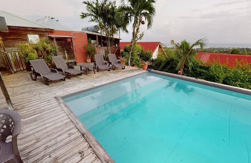 Sainte-Anne House | Gîte Baobab 1: Beautiful pool area with panoramic view