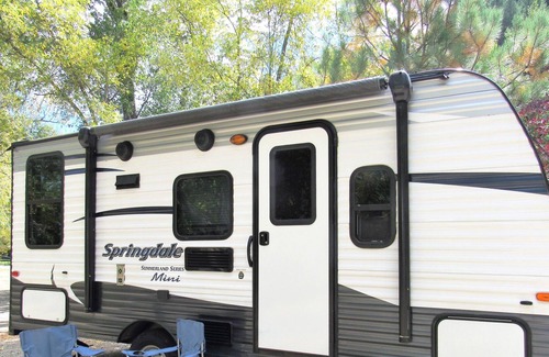 Lewis House | Glamper - Camper set up in a campground or on our property