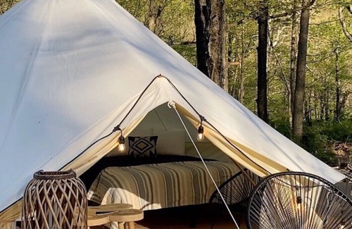 Buffalo Mills RV Rental | Glamping Tent in the Trees at River Mountain Resort