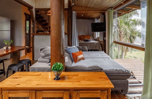 Praia do Rosa RV Rental | Glass House with Stunning View