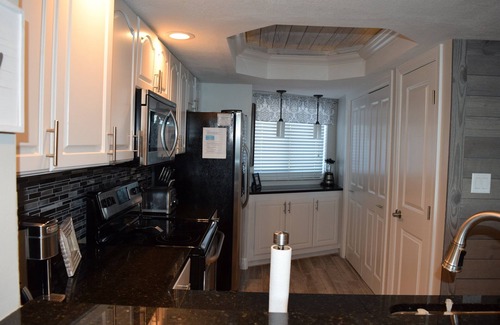 St. Tropez Condo | GORGEOUS BEACHFRONT VIEWS! FREE BEACH SET UP, PRIVATE BEACH, POOL, SPA, AND GYM