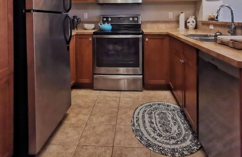 Mission District Condo | Gorgeous Elbow River and City View Condo - Minutes Away From Stampede!