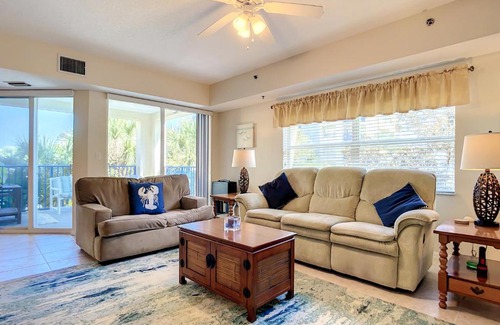 New Smyrna Beach Apartment | Gorgeous Ocean Walk Corner Unit with Water Views OW15-207