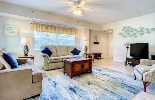 New Smyrna Beach Apartment | Gorgeous Ocean Walk Corner Unit with Water Views OW15-207