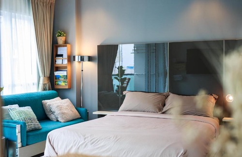 Kram Apartment | Grand blue condominium by Lookkaew