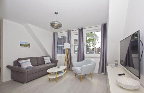 Gross Zicker Apartment | gratis Nutzung vom AHOI Erlebnisbad und Sauna in Sellin - Haus Inselwind FeWo MEERwellen