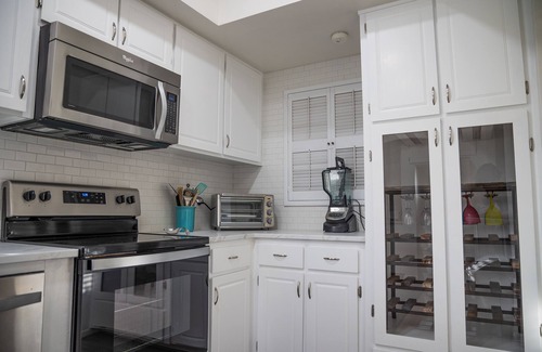 Bullhead City House | Great open one-story home for family entertaining. Relaxing back concrete porch.