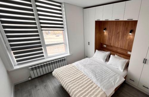 Almaty Apartment | Great Raiymbek residence 17, 1BR & drinking water as a gift