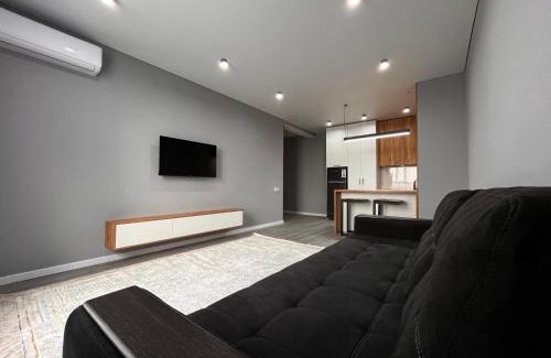 Almaty Apartment | Great Raiymbek residence 17, 1BR & drinking water as a gift