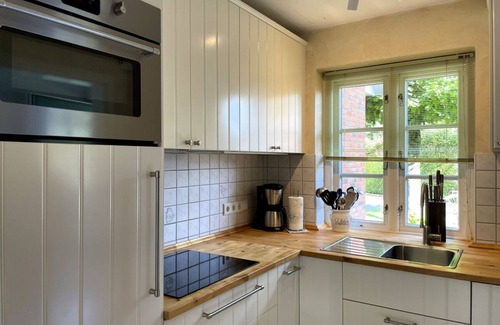 Wyk auf Foehr Apartment | Green Eilun 13 - Modernes Reihenhaus mit Garten, Spielecke, Waldzugang und Nähe zum Südstrand