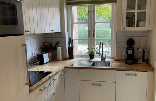 Wyk auf Foehr Apartment | Green Eilun 13 - Modernes Reihenhaus mit Garten, Spielecke, Waldzugang und Nähe zum Südstrand