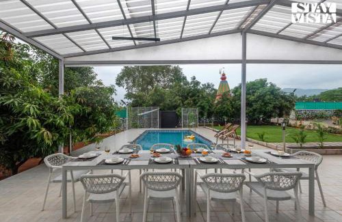Karjat Villa | Grey Hues with Swimming Pool & Lawn at Karjat by StayVista