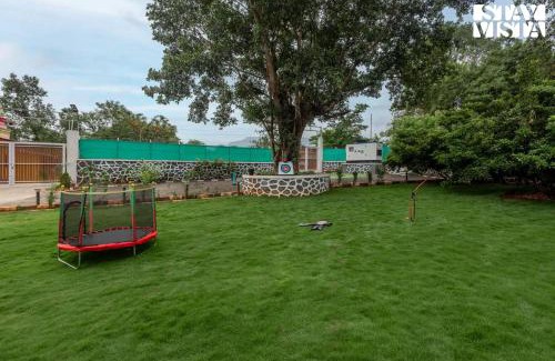 Karjat Villa | Grey Hues with Swimming Pool & Lawn at Karjat by StayVista