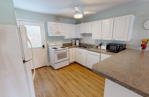 Fort Walton Beach Condo | Ground Floor Pool Front Condo Sleeps 8 with easy beach access by RedAwning