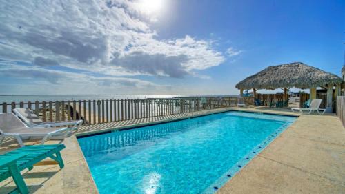 Flour Bluff House | Group Getaway w Pool, Boat Dock 2 Homes Laguna Village Retreat by AvantStay
