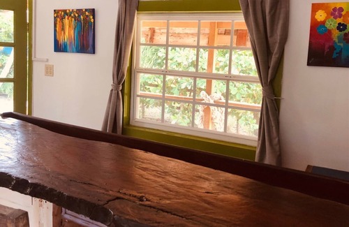 Caye Caulker House | Gumbo Limbo's Dreaded Grape Cabana - Steps from Ocean, Free Bikes, Free WiFi