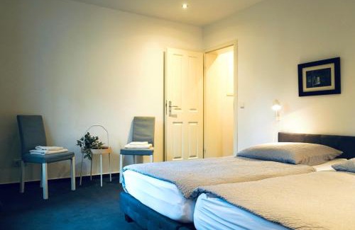 Stadtmitte Apartment | Haus im Grünen für 6 Personen-3 Schlafzimmer- 3 Bädern -Waschmaschine-große Terrasse- vollausgestattete Küche