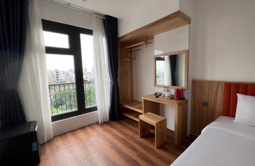 District 4 Hotel | Haven Hut Riverside Hotel