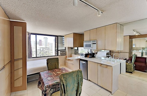 McCully - Moiliili Condo | Hawaiian Monarch 1607 Condo by RedAwning