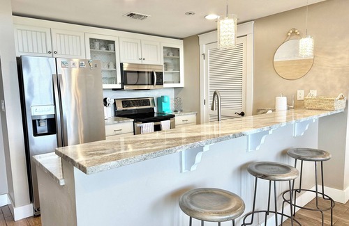Villa Lago Condo | Heart of Village of Baytowne Wharf with views of Marina, Fireworks and Concerts!