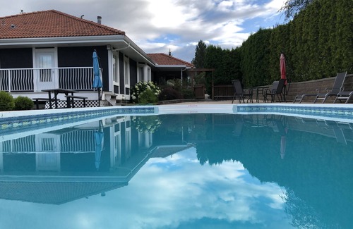 West Kelowna Estates House | heated pool, hot tub, 4 bedrooms, 8 beds, lake view, city view, mountain view