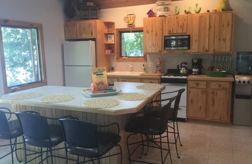 Interlochen Cottage | Hidden Gem Cottage on Bass Lake with Hot Tub - Summer Memories Last Forever