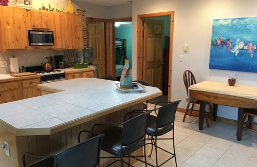 Interlochen Cottage | Hidden Gem Cottage on Bass Lake with Hot Tub - Summer Memories Last Forever