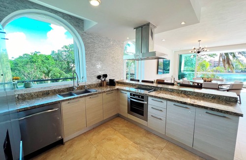 Puerto Aventuras Apartment | High-End Waterfront Condo Secrets Waters