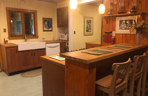 Inlet House | HISTORIC ADIRONDACK CAMP WITH 100 FT OF LAKE FRONTAGE & ALL MODERN AMENITIES