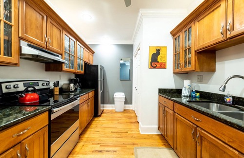 Beach Institute Apartment | Historic Charming Cottage with King Bed for Two by Lucky Savannah