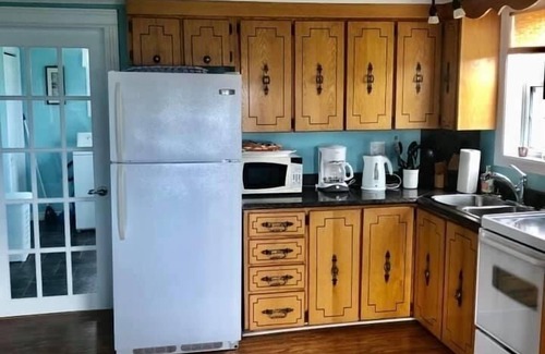 Newfoundland House | Historic Saltbox House overlooking the ocean.