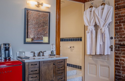 Port Townsend Apartment | Historic Town View Room with bay window overlooking Water Street