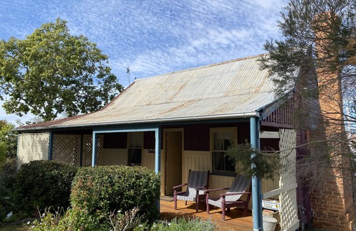 Texas Cottage | Historical workers cottage in the Main Street of Texas